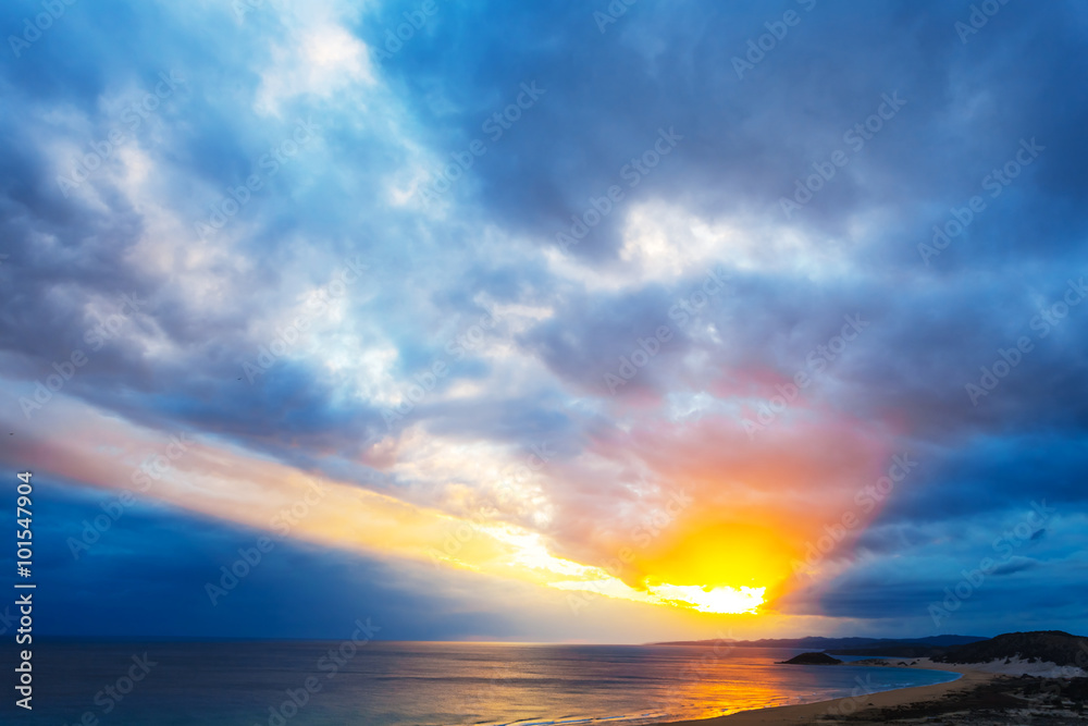 dramatic sunset over a sea