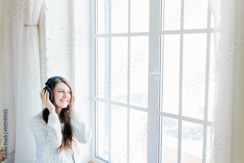woman listening music with headphones. relax and unwind