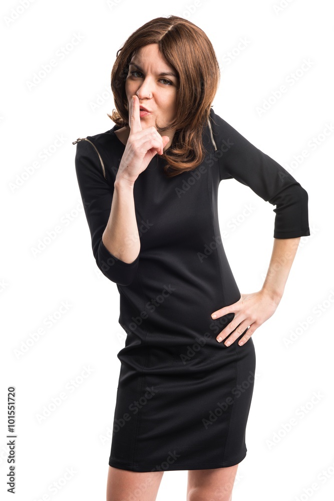 Brunette woman making silence gesture Brunette woman making silence gesture
