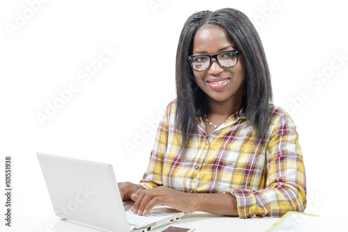 young African american  working on laptop on the white backgroun