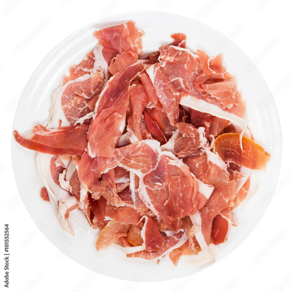 top view sliced prosciutto crudo on plate isolated top view sliced prosciutto crudo on plate isolated