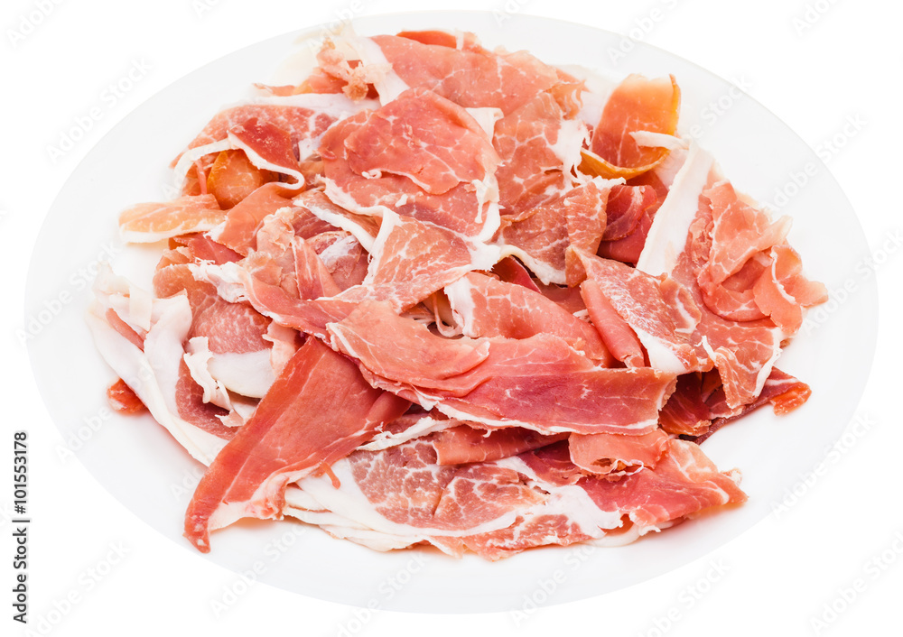 thin sliced uncooked jerked pork on plate isolated thin sliced uncooked jerked pork on plate isolated