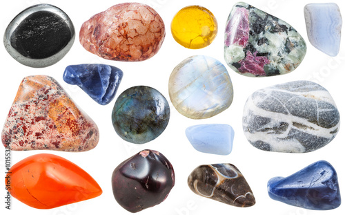 many tumbled ornamental gem stones isolated