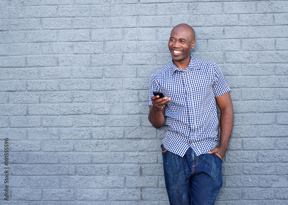 Cool african american man with a mobile phone Cool african american man with a mobile phone