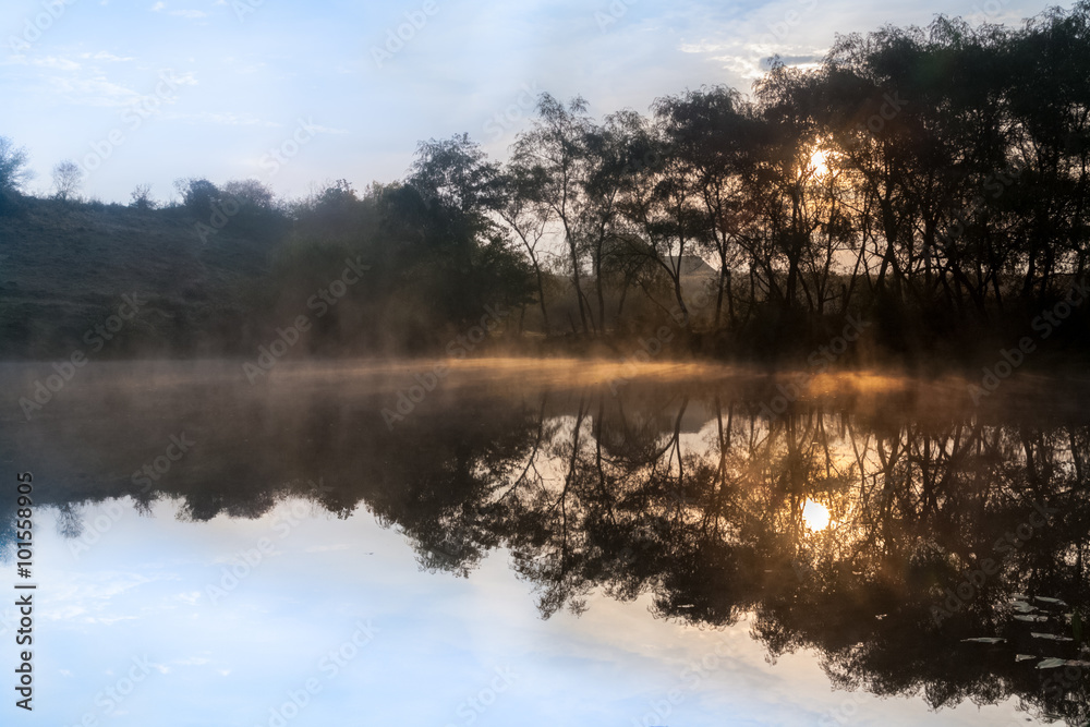 Sunrise, the mist over the lake. Sunrise, the mist over the lake.