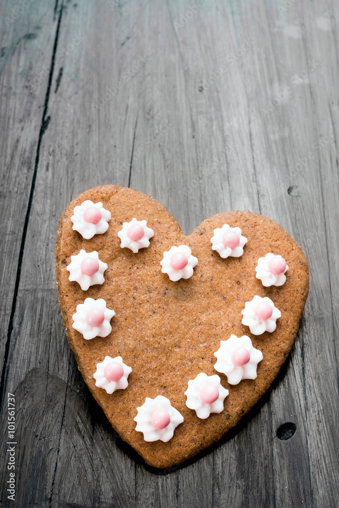 Heart shaped cookies on dark wooden background Heart shaped cookies on dark wooden background