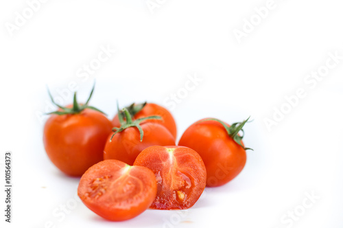 Fresh ripe cherry tomatoes isolated in white