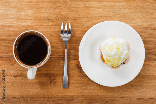 Sweet muffin and coffee. Ov...