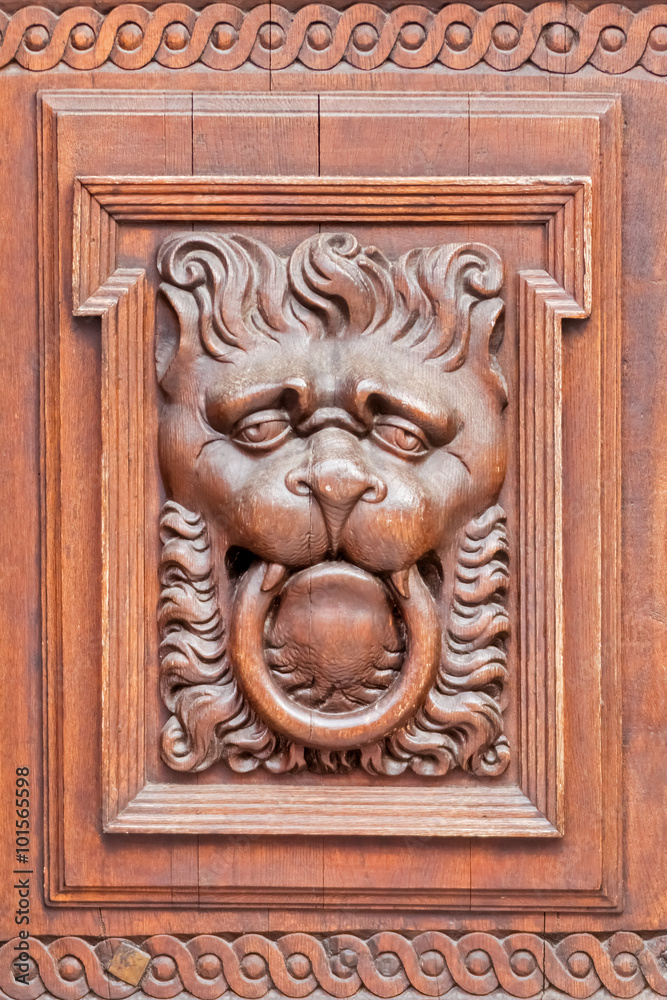 Vintage wooden bas-relief of a lion
