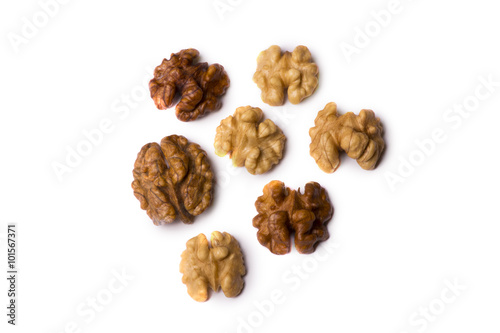halves of a walnut isolated on a white background.