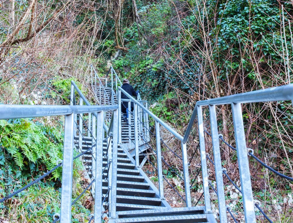 Iron staircase and a girl on her.