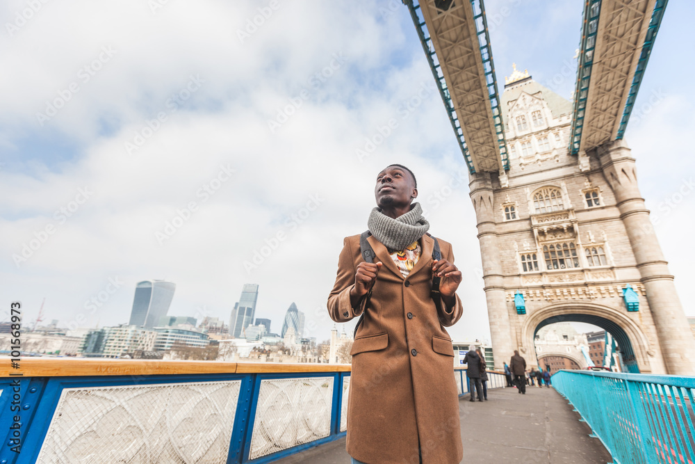 Young black man on Tower Bridge in London