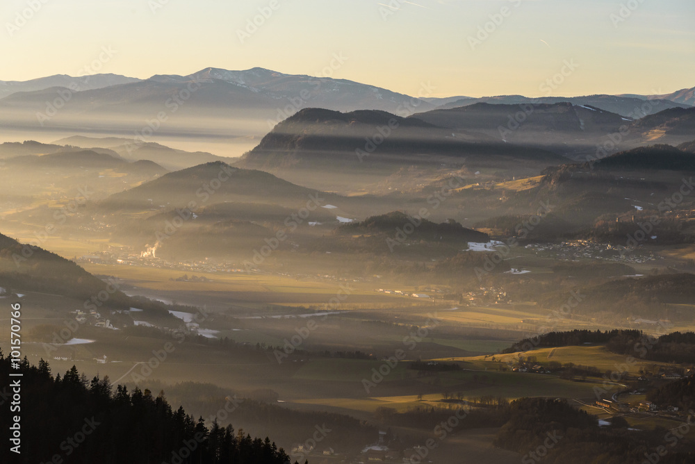 Beautiful sunset in mountains with fog in valleys.Carinthia,Austria.