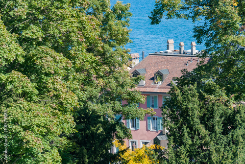 Ancient building at Lake Geneva, Switzerland with Garden on Side