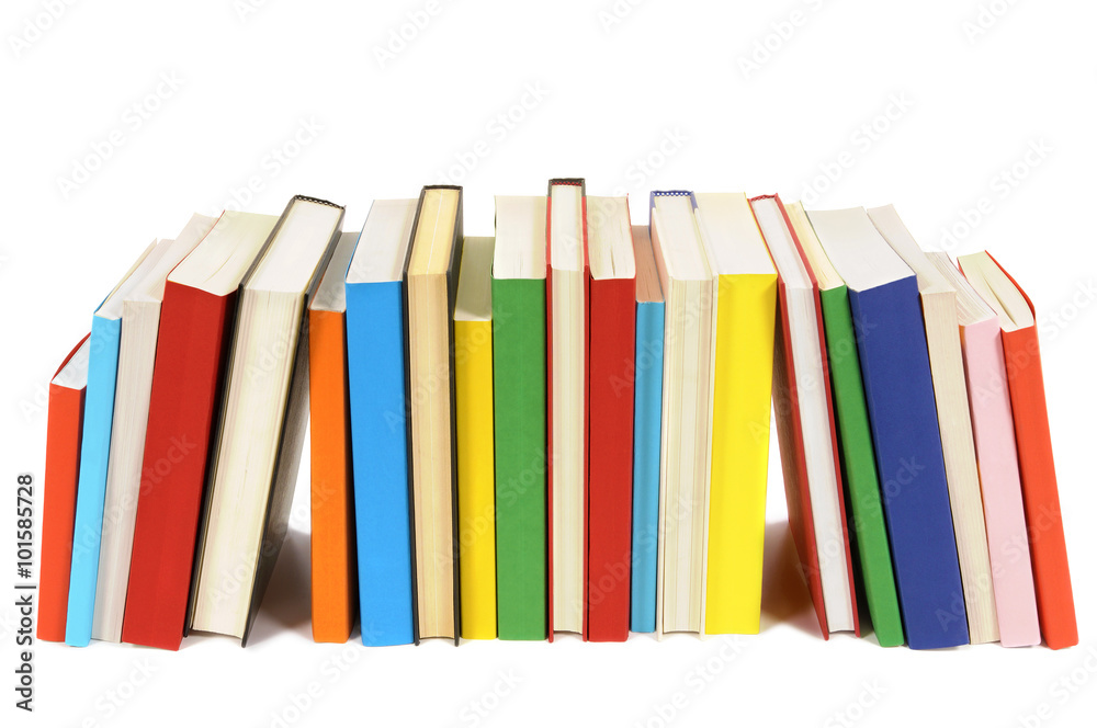 Naklejka premium Long row of colorful library books isolated on white background college school bookshelf photo
