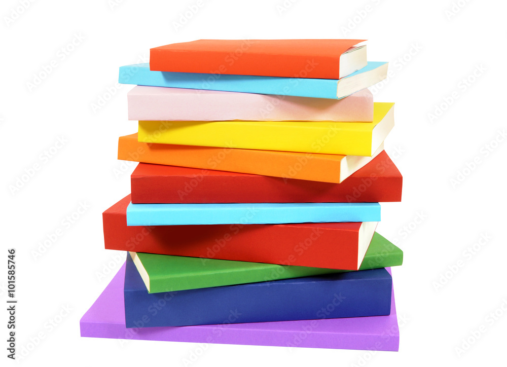 Obraz premium Closeup untidy small pile of paperback books isolated on white background