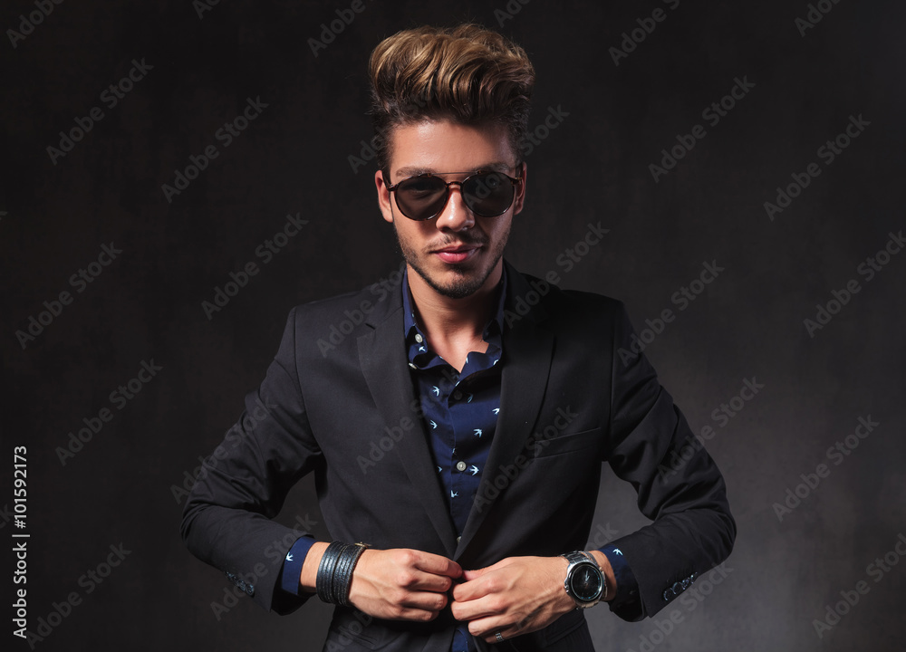 skinny model posing in dark studio background wearing sunglasses skinny model posing in dark studio background wearing sunglasses