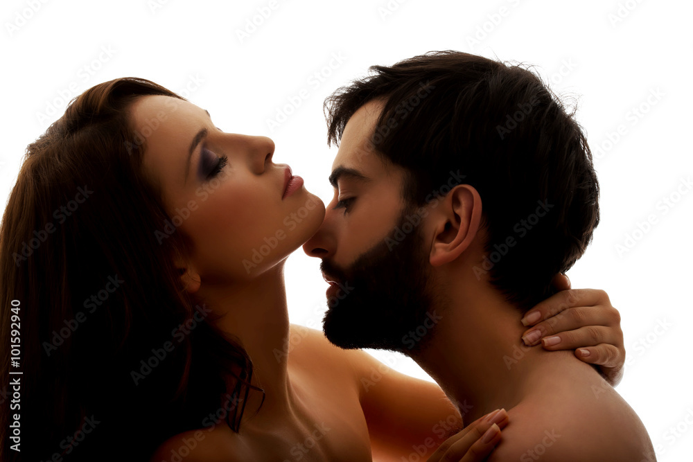 Caucasian man kissing woman's neck. Caucasian man kissing woman's neck.