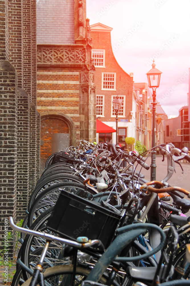Φωτογραφία Parked bicycles on the street in the historic center of Haarlem,