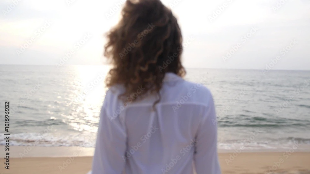 Female Back on the Beach by the Sea Female Back on the Beach by the Sea