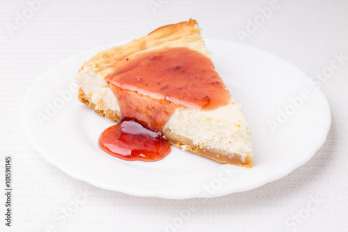 Piece of cheesecake on white saucer