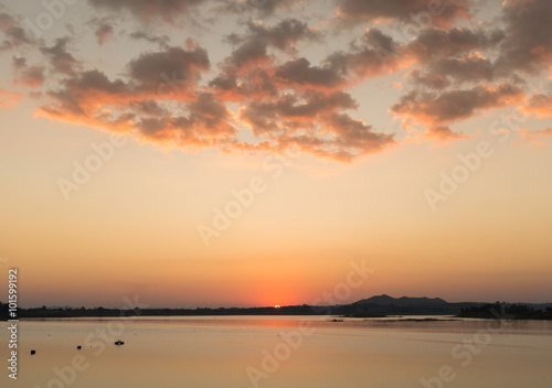 Twilight time with calm lake and beautiful cloud.