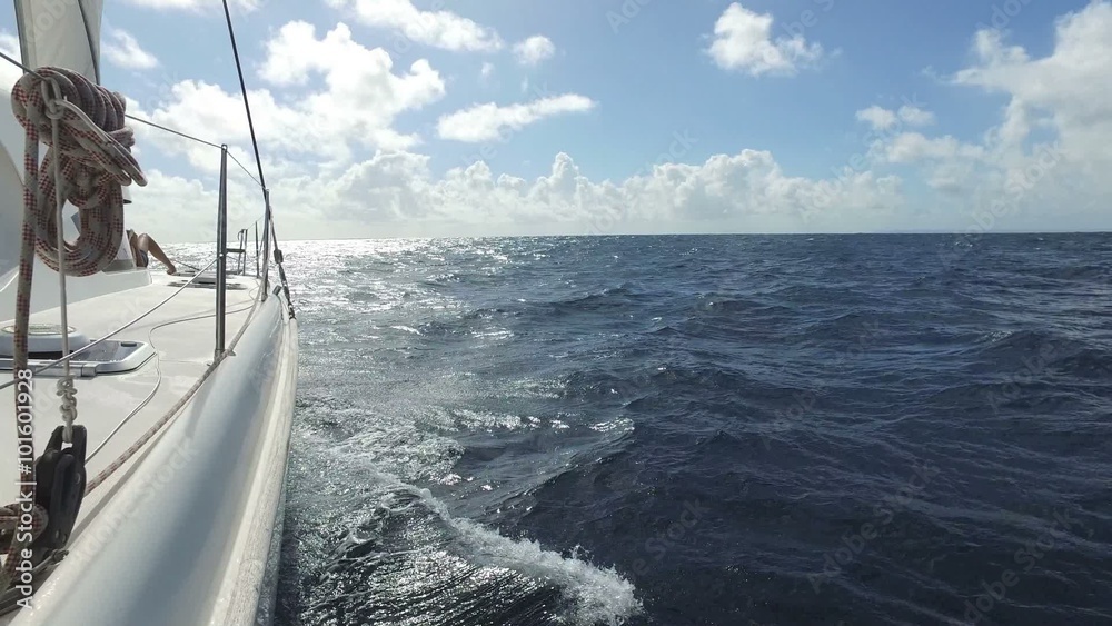 Sailboat cruising over caribbean sea