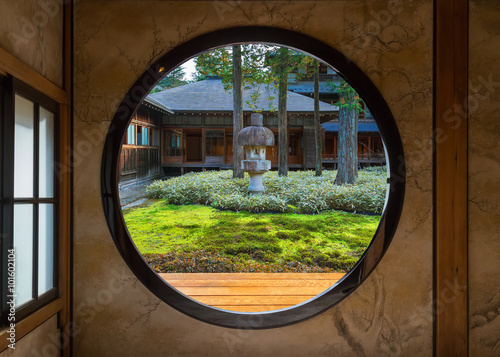 View of a Japanese Garden Through a Round Window