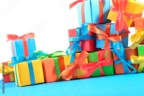 Colorful gifts close-up on a white