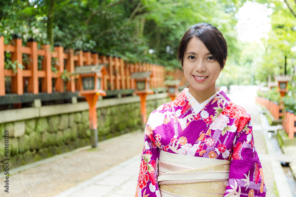 Japanese woman at temple with traditional kimono