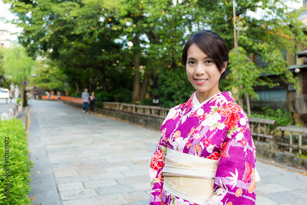 Asian Woman with traditional japanese costume at Gion Asian Woman with traditional japanese costume at Gion