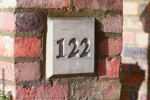Obraz na płótnie House number 122 sign