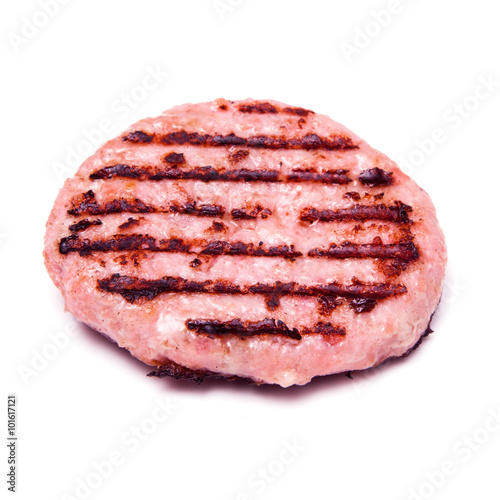 Grilled crocodile meat burger isolated on a white studio background.