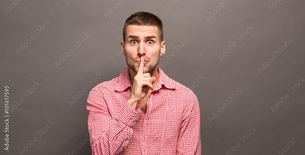Man making a shushing gesture Man making a shushing gesture