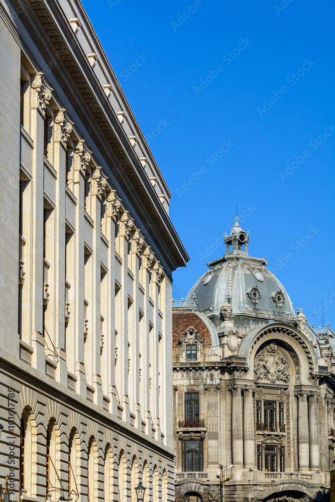 Buildings with windows and blue sky. Picture with architectural