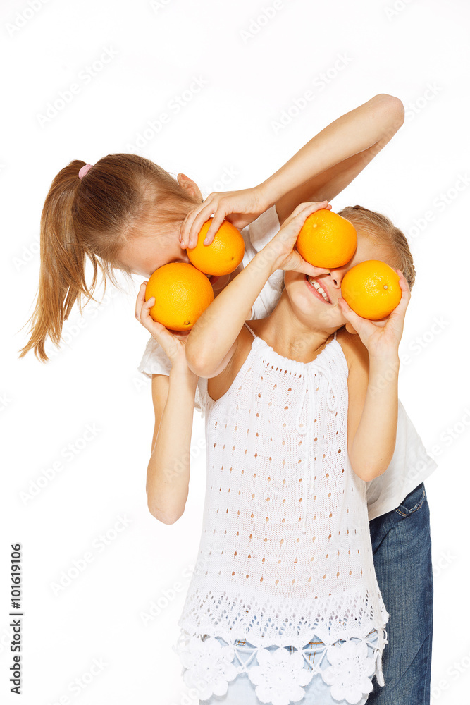 Beauty young girls with fresh oranges Beauty young girls with fresh oranges