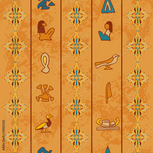 Egypt colorful ornament with ancient Egyptian hieroglyphs on aged paper background,. Vector seamless pattern. Hand drawn illustration