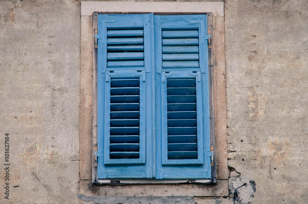 old blue blind window