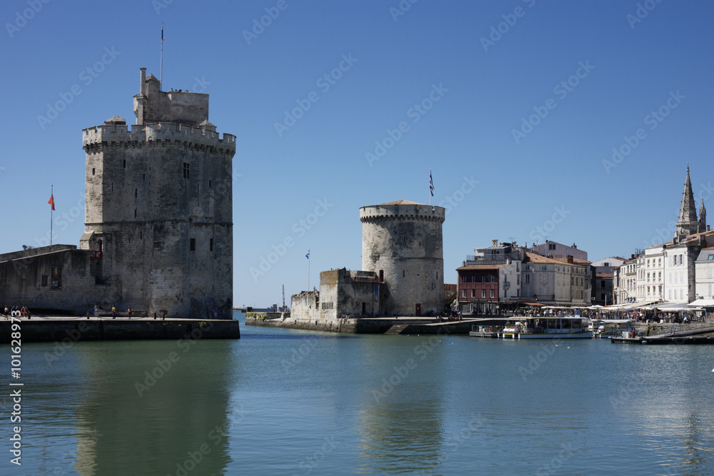 Old Harbor Entrance showing St Nicolas Tower and Chain Tower Port  La Rochelle France.