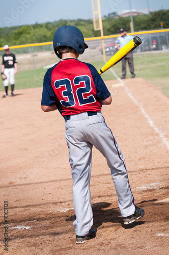 American baseball boy getting ready to bat