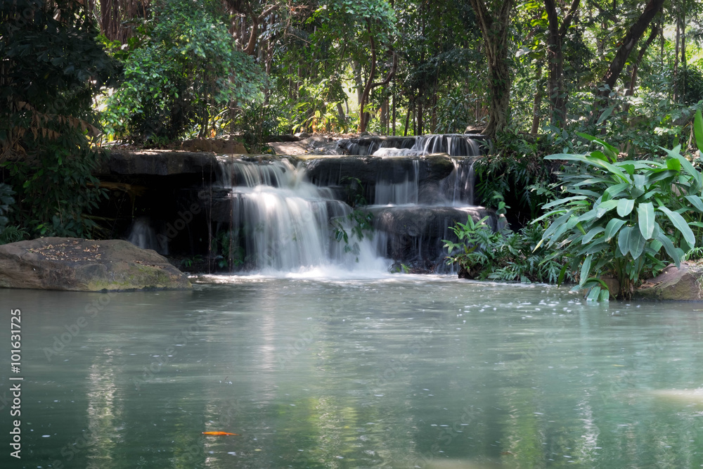 Naklejka premium Beautiful water fall in deep forest