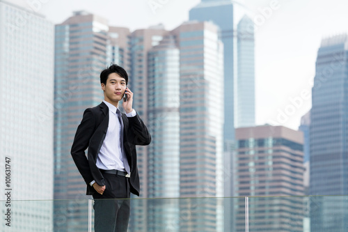 Asian business man talk to cellphone