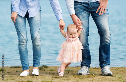 First steps of the little girl