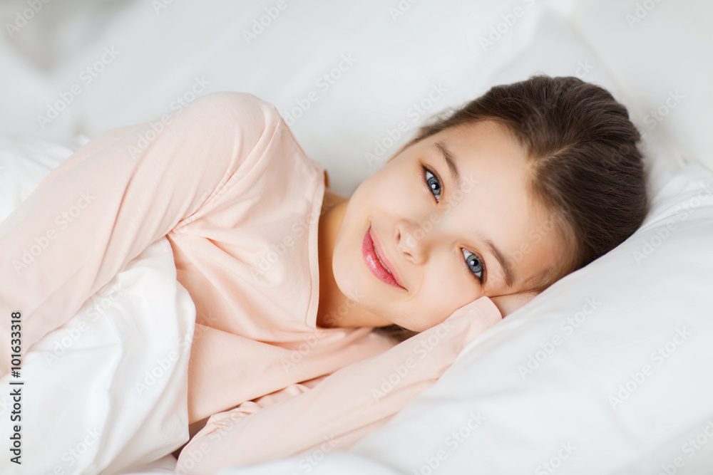 happy smiling girl lying awake in bed at home happy smiling girl lying awake in bed at home