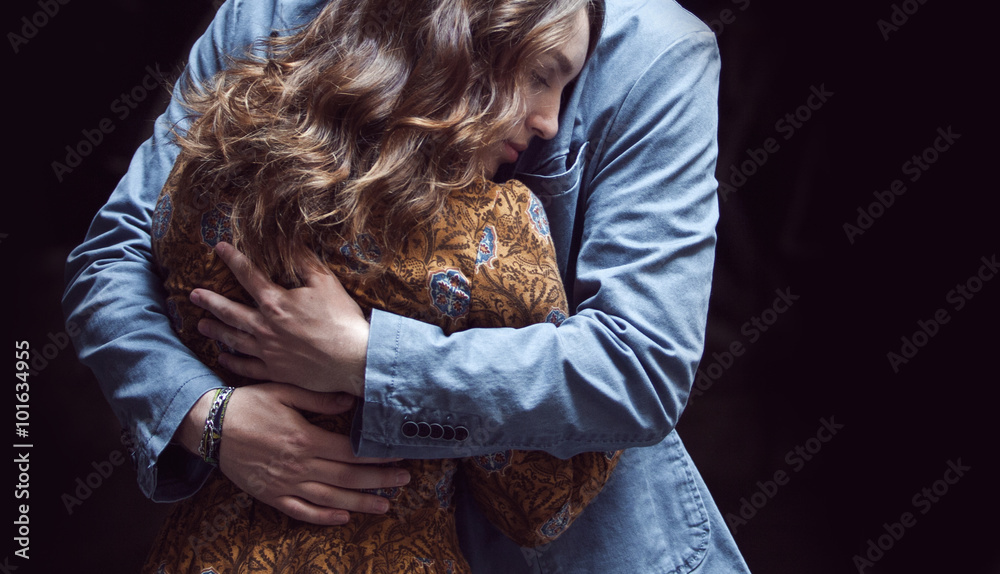 Young couple in love outdoor. Man hugs woman. kiss on the forehead Stock  Photo | Adobe Stock