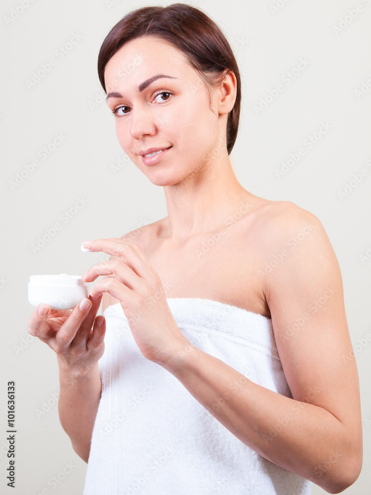 young beautiful woman wrapped in towel isolated young beautiful woman wrapped in towel isolated