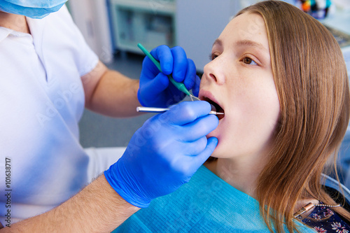 dentist treats teeth