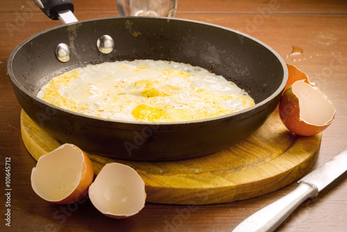 making breakfast with fresh eggs
