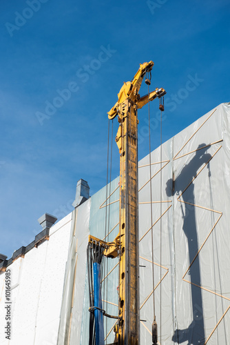 rammer standing in big constrauction site - sunny photo