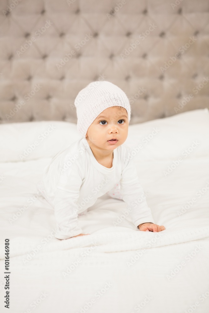 Smiling baby on bed Smiling baby on bed